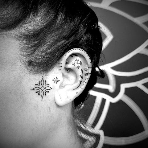 butterfly face tattoo | Face tattoos, Behind ear tattoos, Star face tattoo